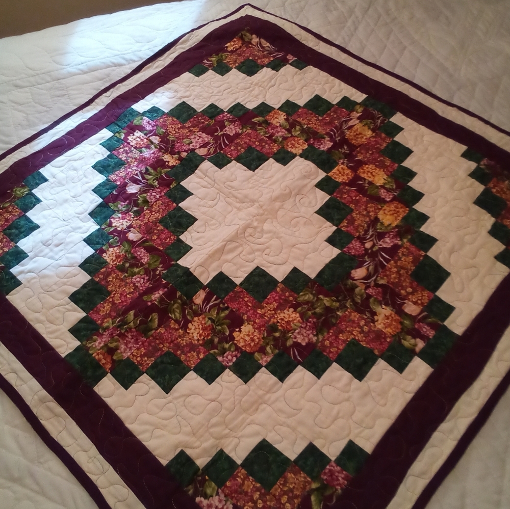 Handmade Floral Quilt with Green and Purple Accents